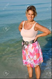 mature sexy eyemark attractive woman standing ocean surf stock photo mature fifty